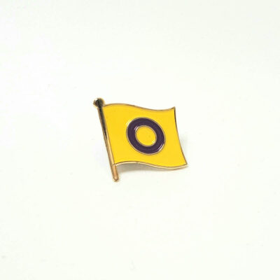 A metal and epoxy intersex flag pin.