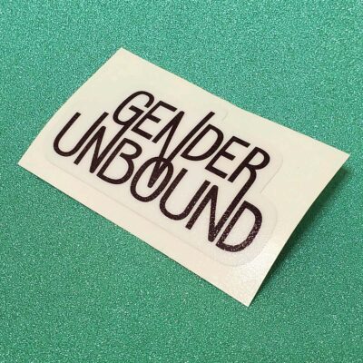 A white sticker with a black gender unbound logo.